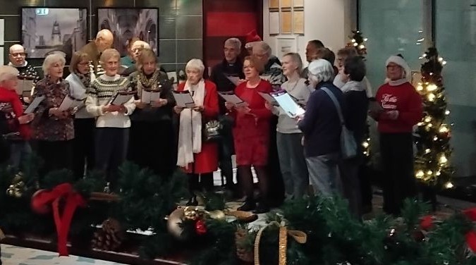 St James community singing festive carols at the Mercure Hotel, Rowton, Chester 